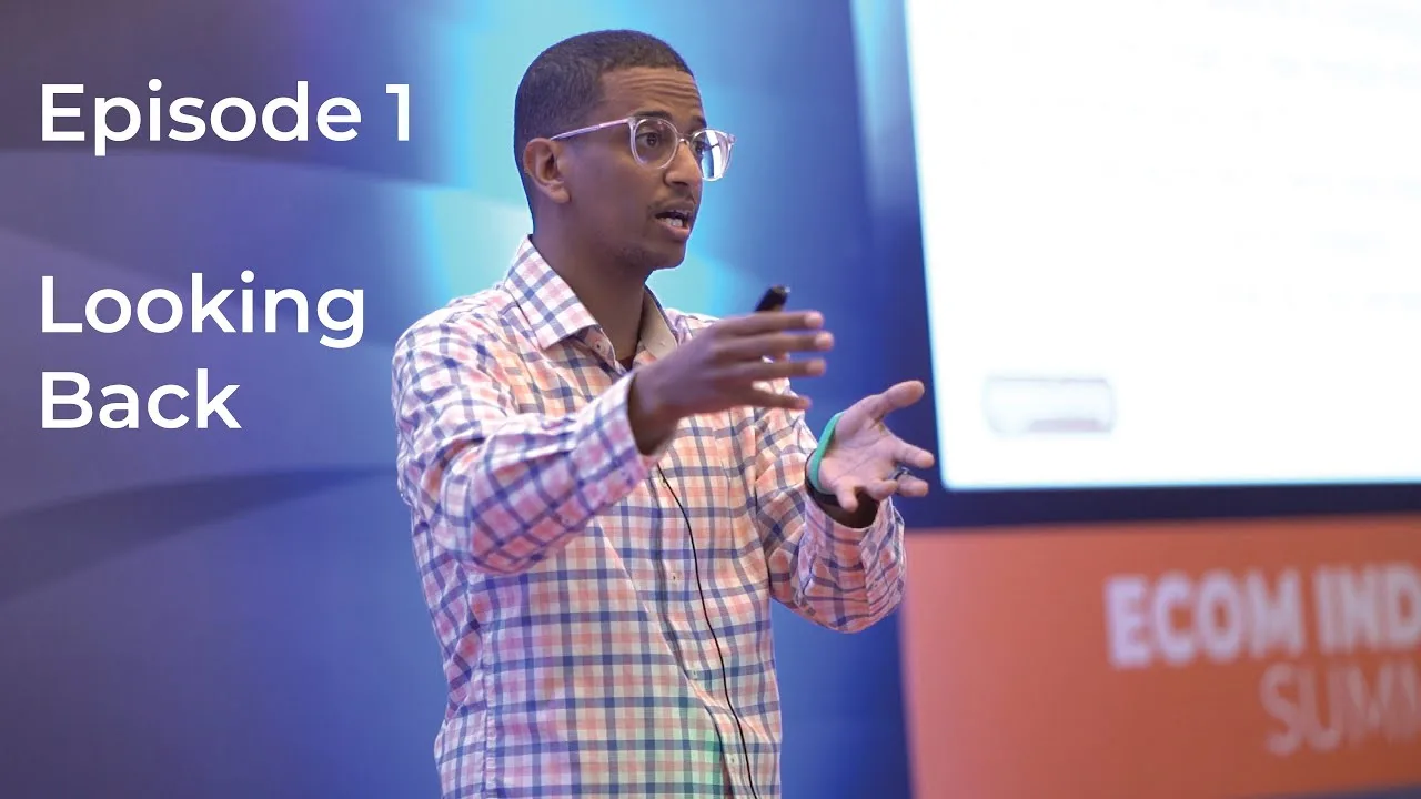 George Meressa speaking on stage